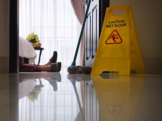 Slip and fall by wet floor sign