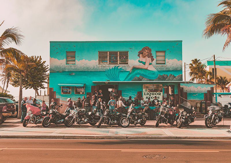 Motorcycles parked in front on building 